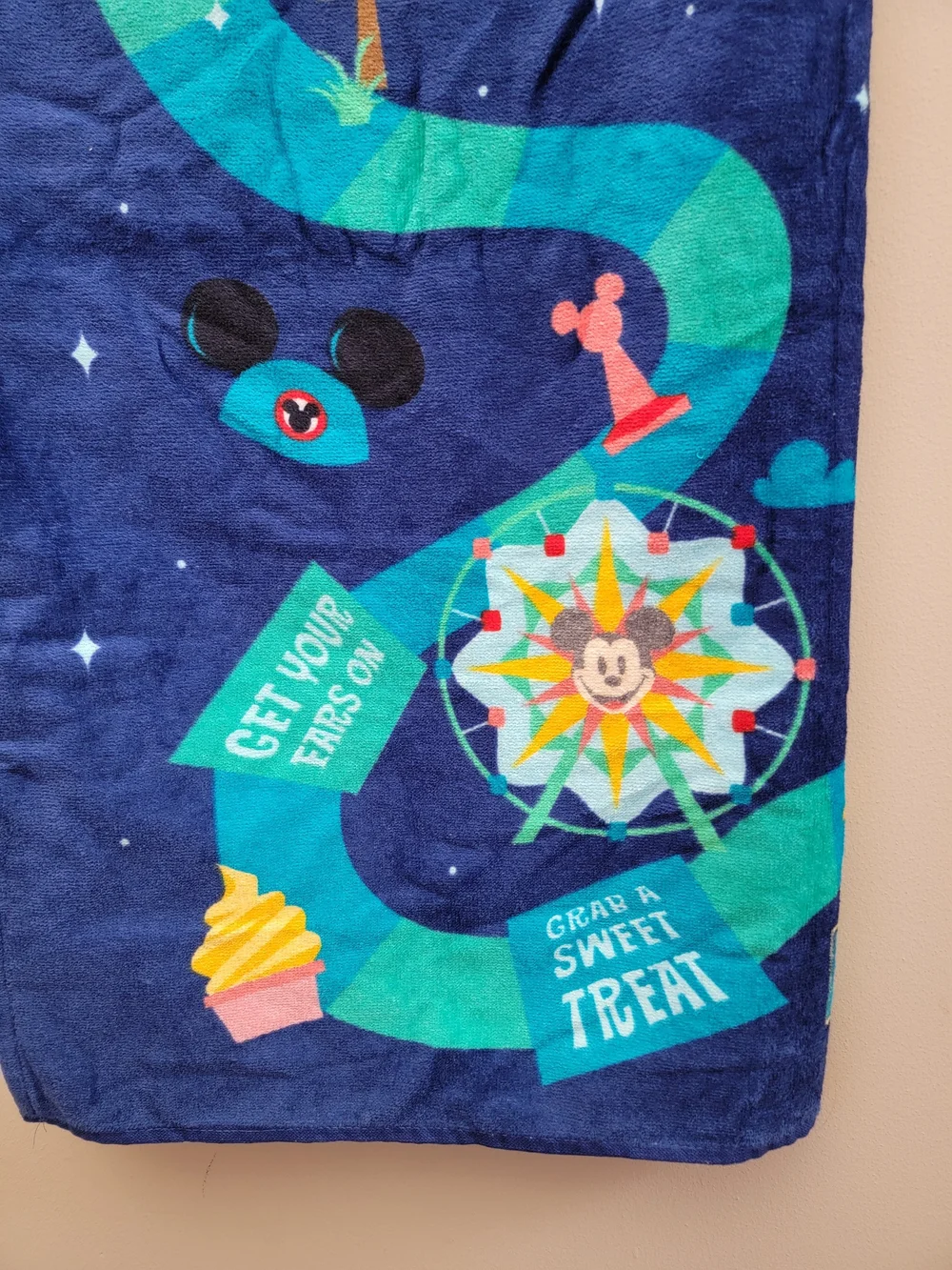 Disney Parks Beach Towel Navy Blue with Teal, Yellow & Pink Character Design